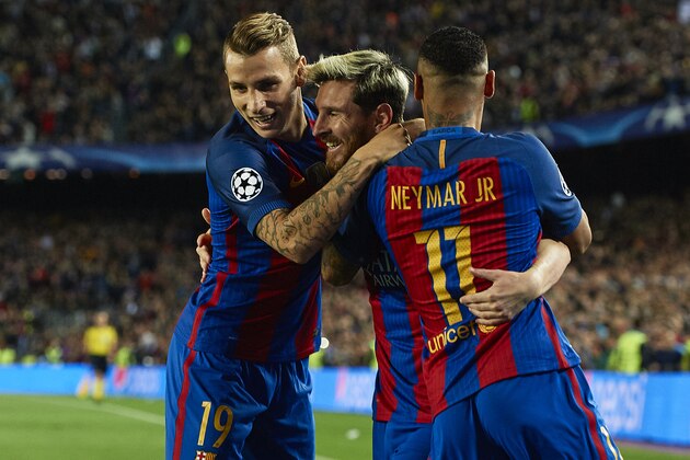 BARCELONA, SPAIN - OCTOBER 19:  Lionel Messi of Barcelona celebrates scoring his team's first goal with his teammates Neymar JR and Lucas Digne during the UEFA Champions League Group C match between FC Barcelona and Manchester City FC at Camp Nou on October 19, 2016 in Barcelona.  (Photo by Manuel Queimadelos Alonso/Getty Images)