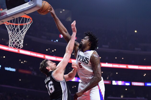 LOS ANGELES, CA - DECEMBER 22:  DeAndre Jordan #6 of the Los Angeles Clippers dunks the ball over Pau Gasol #16 of the San Antonio Spurs during the game at Staples Center on December 22, 2016 in Los Angeles, California.  (Photo by Harry How/Getty Images)