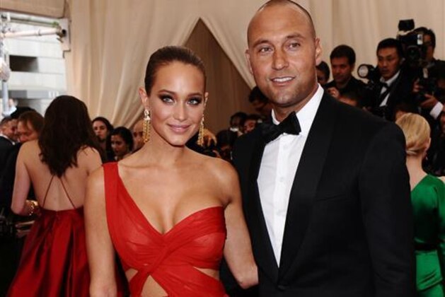 FILE - In this May 4, 2015, file photo, Derek Jeter, right, and Hannah Davis arrive at The Metropolitan Museum of Art's Costume Institute benefit gala celebrating