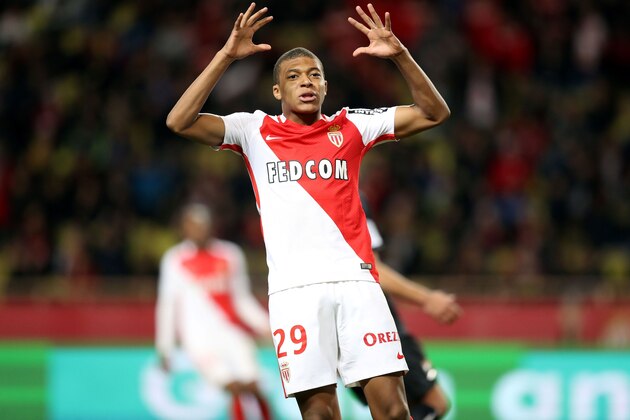 Monaco's French forward Kylian Mbappe Lottin reacts during the French L1 football match between Monaco (ASM) and Caen (SMC) on December 21, 2016 at the Louis II Stadium in Monaco. / AFP / VALERY HACHE        (Photo credit should read VALERY HACHE/AFP/Getty Images)