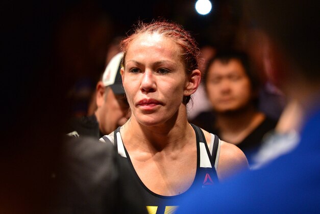 Sep 24, 2016; Brasilia, Brazil;  Cris Cyborg (red gloves) before her fight against Lina Lansberg (blue gloves) during UFC Fight Night at Nilson Nelson Gymnasium. Mandatory Credit: Jason Silva-USA TODAY Sports
