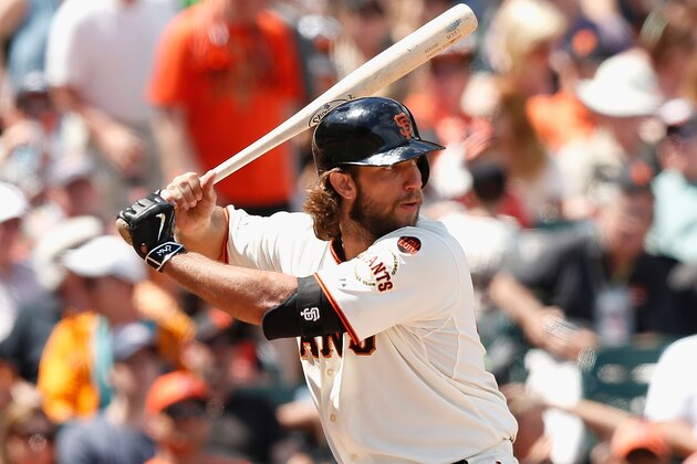 SAN FRANCISCO, CA - JUNE 28:  PItcher Madison Bumgarner #40 of the San Francisco Giants hits a home run in the seventh inning against the Colorado Rockies at AT&T Park on June 28, 2015 in San Francisco, California.  (Photo by Lachlan Cunningham/Getty Images)