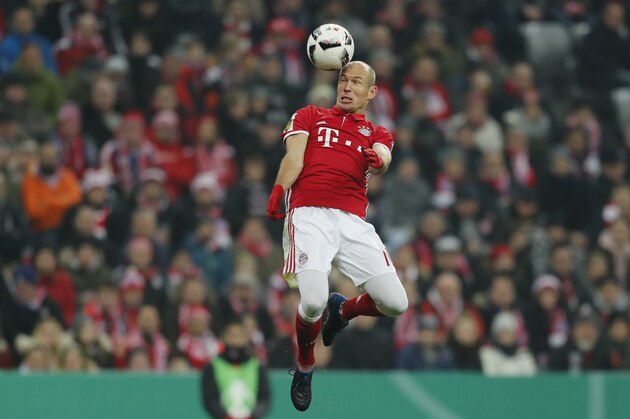 MUNICH, GERMANY - FEBRUARY 07:  Arjen Robben of FC Bayern Muenchen jumps for a header during the DFB Cup Round Of 16 match between Bayern Muenchen and VfL Wolfsburg at Allianz Arena on February 7, 2017 in Munich, Germany.  (Photo by Boris Streubel/Getty Images)
