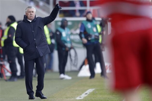 Bayern's head coach Carlo Ancelotti gestures during the German Bundesliga soccer match between FC Ingolstadt and FC Bayern Munich in Ingolstadt, Germany, Saturday, Feb. 11, 2017. (AP Photo/Matthias Schrader)