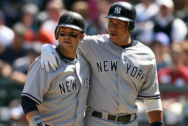 SEATTLE  - AUGUST 16:  Alex Rodriguez #13 (R) of the New York Yankees congratulates Nick Swisher #33 after Swisher hit a two-run home run against the Seattle Mariners on August 16, 2009 at Safeco Field in Seattle, Washington. (Photo by Otto Greule Jr/Getty Images)