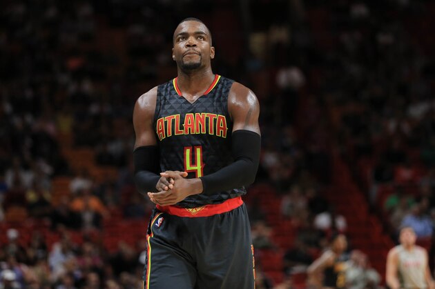MIAMI, FL - NOVEMBER 15: Paul Millsap #4 of the Atlanta Hawks reacts during the game against the Miami Heat at American Airlines Arena on November 15, 2016 in Miami, Florida. NOTE TO USER: User expressly acknowledges and agrees that, by downloading and or using this photograph, User is consenting to the terms and conditions of the Getty Images License Agreement.  (Photo by Rob Foldy/Getty Images)