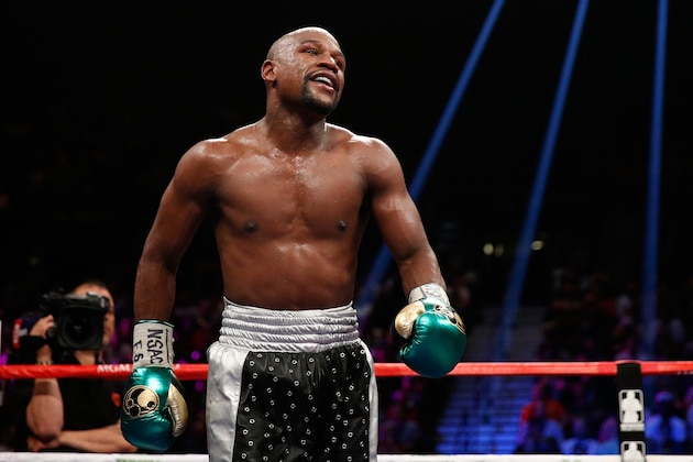 LAS VEGAS, NV - SEPTEMBER 12:  Floyd Mayweather Jr. walks in the ring during his WBC/WBA welterweight title fight against Andre Berto at MGM Grand Garden Arena on September 12, 2015 in Las Vegas, Nevada.  (Photo by Ezra Shaw/Getty Images)