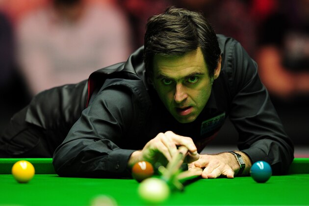 LONDON, ENGLAND - JANUARY 12:  Ronnie O'Sullivan of England plays a shot during his round one match against Mark Williams of Wales on Day Three of The Dafabet Masters at Alexandra Palace on January 12, 2016 in London, England.  (Photo by Dan Mullan/Getty Images)