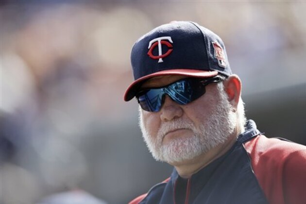 Minnesota Twins manager Ron Gardenhire is seen in the dugout during a baseball game against the Detroit Tigers in Detroit, Sunday, Sept. 28, 2014. (AP Photo/Carlos Osorio)