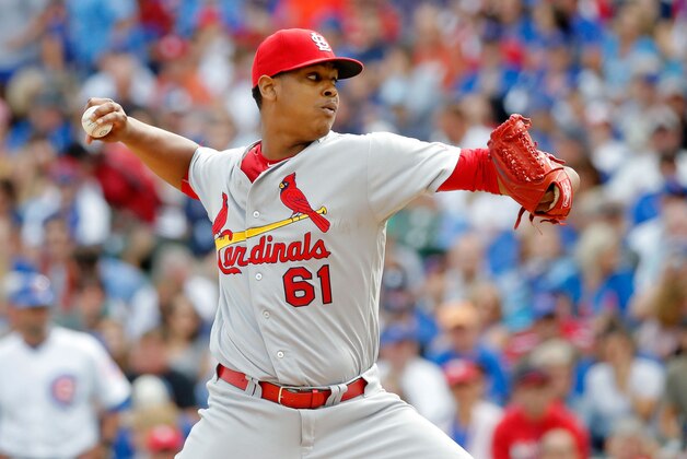 CHICAGO, IL - SEPTEMBER 24:  Alex Reyes #61 of the St. Louis Cardinals pitches against the Chicago Cubs during the first inning at Wrigley Field on September 24, 2016 in Chicago, Illinois.  (Photo by Jon Durr/Getty Images)