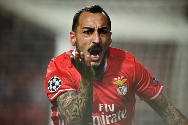 Benfica's Greek forward Konstantinos Mitroglou celebrates after scoring during the UEFA Champions League round of 16 first leg football match SL Benfica vs Borussia Dortmund at the Luz stadium in Lisbon on February 14, 2017. / AFP / PATRICIA DE MELO MOREIRA        (Photo credit should read PATRICIA DE MELO MOREIRA/AFP/Getty Images)