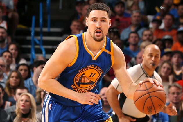 OKLAHOMA CITY, OK - FEBRUARY 11: Klay Thompson #11 of the Golden State Warriors brings the ball up court during the game against the Oklahoma City Thunder on February 11, 2017 at Chesapeake Energy Arena in Oklahoma City, Oklahoma. NOTE TO USER: User expressly acknowledges and agrees that, by downloading and or using this photograph, User is consenting to the terms and conditions of the Getty Images License Agreement. Mandatory Copyright Notice: Copyright 2017 NBAE (Photo by Layne Murdoch/NBAE via Getty Images)