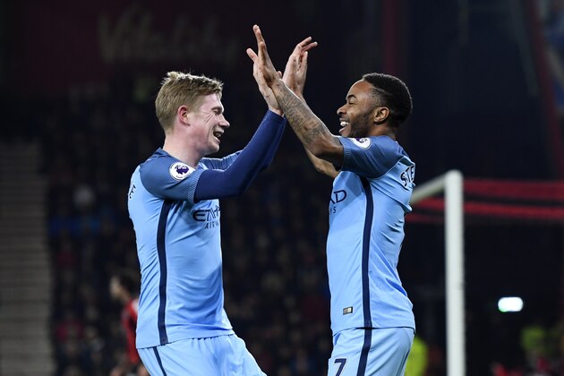 BOURNEMOUTH, ENGLAND - FEBRUARY 13:  Raheem Sterling of Manchester City celebrates with Kevin De Bruyne after scoring the opening goal during the Premier League match between AFC Bournemouth and Manchester City at Vitality Stadium on February 13, 2017 in Bournemouth, England.  (Photo by Stu Forster/Getty Images)