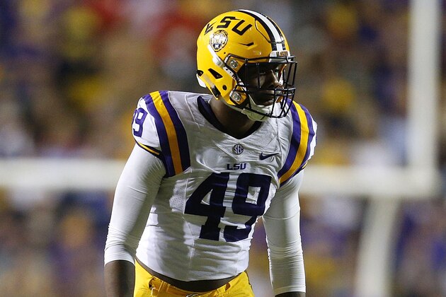 BATON ROUGE, LA - OCTOBER 22:  Arden Key #49 of the LSU Tigers defends during a game against the Mississippi Rebels at Tiger Stadium on October 22, 2016 in Baton Rouge, Louisiana.  (Photo by Jonathan Bachman/Getty Images)