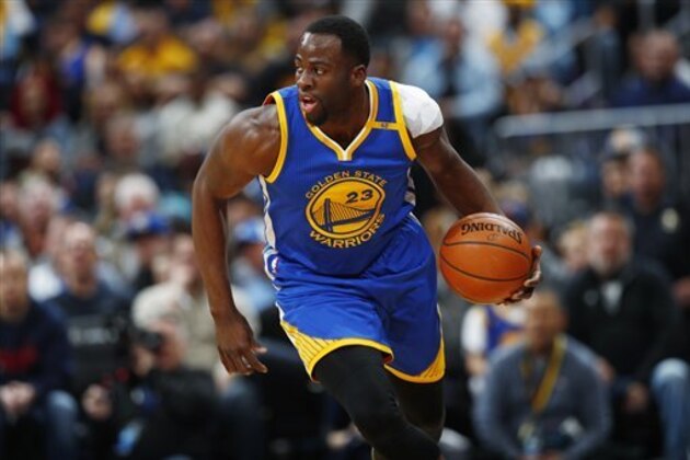 Golden State Warriors forward Draymond Green (23) in the first half of an NBA basketball game Monday, Feb. 13, 201, in Denver. (AP Photo/David Zalubowski)