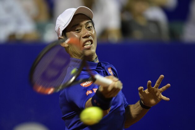 Japan's tennis player Kei Nishikori returns the ball to Argentina's Diego Schwartzman during their Argentina Open single tennis match at the Lawn Tennis Club in Buenos Aires on February 15, 2017. / AFP / JUAN MABROMATA        (Photo credit should read JUAN MABROMATA/AFP/Getty Images)