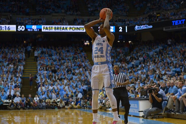 CHAPEL HILL, NC - JANUARY 26:  Kenny Williams #24 of the North Carolina Tar Heels takes a three-point shot against the Virginia Tech Hokies during the game at the Dean Smith Center on January 26, 2017 in Chapel Hill, North Carolina. North Carolina won 91-72.  (Photo by Grant Halverson/Getty Images)