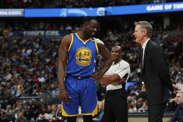 Golden State Warriors forward Draymond Green (23) and Golden State Warriors head coach Steve Kerr in the first half of an NBA basketball game Monday, Feb. 13, 201, in Denver. (AP Photo/David Zalubowski)