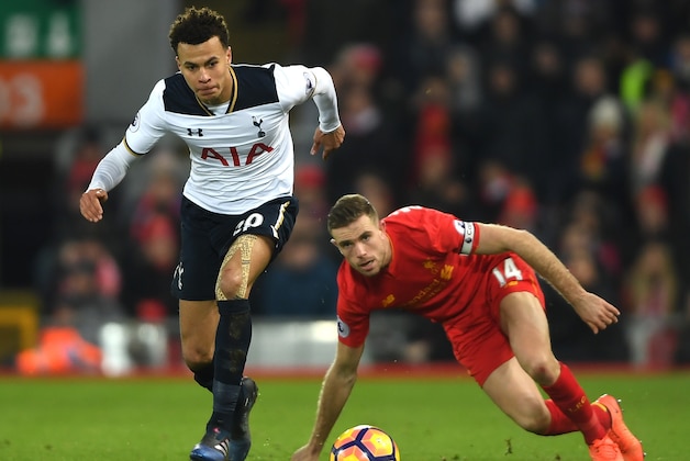 LIVERPOOL, ENGLAND - FEBRUARY 11:  Dele Alli of Tottenham Hotspur goes past Jordan Henderson of Liverpool during the Premier League match between Liverpool and Tottenham Hotspur at Anfield on February 11, 2017 in Liverpool, England.  (Photo by Mike Hewitt/Getty Images for Tottenham Hotspur FC)