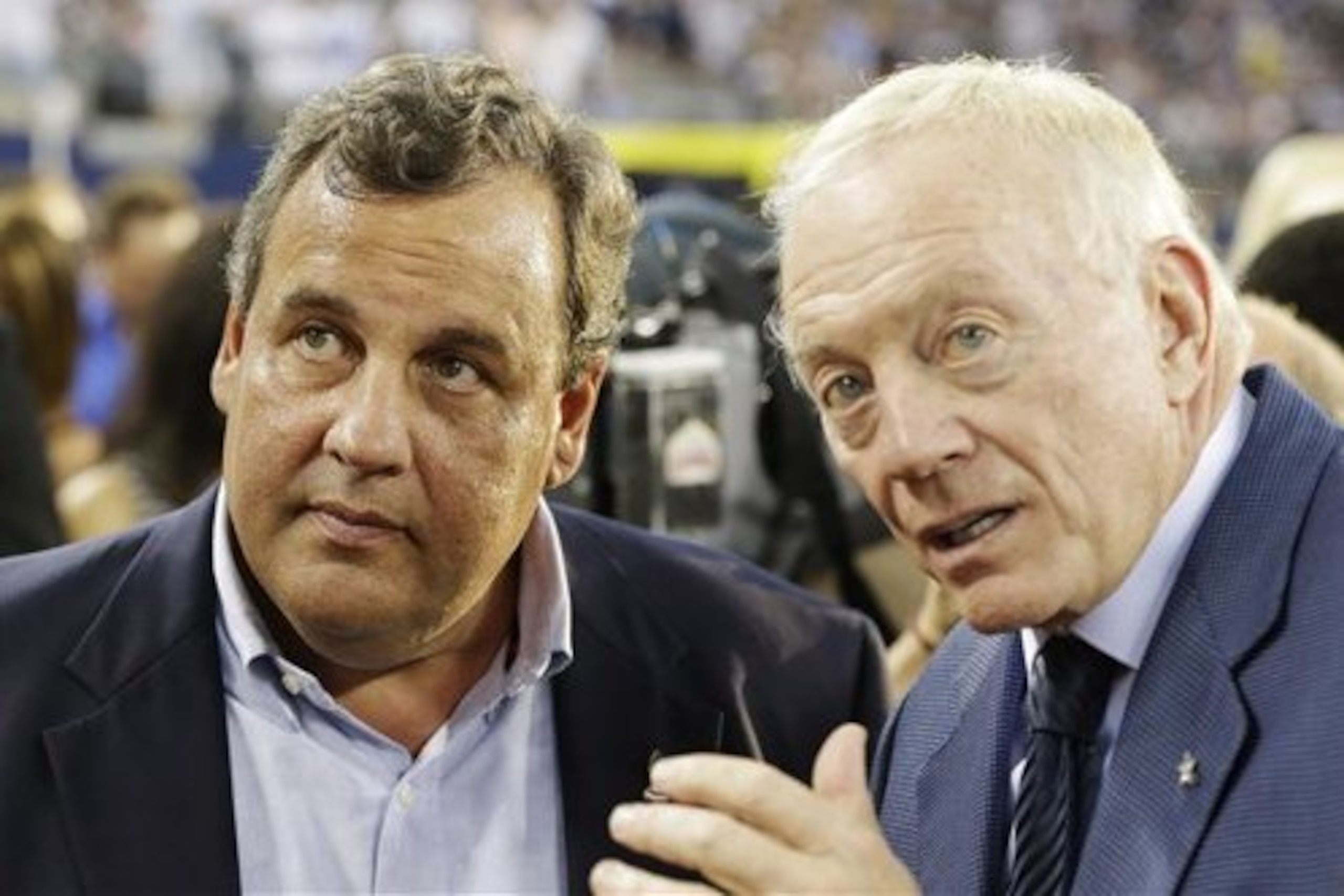 New Jersey Governor Chris Christie, left and Dallas Cowboys owner Jerry Jones talk before a NFL football game against the New York Giants Sunday, Sept. 8, 2013, in Arlington, Texas. (AP Photo/LM Otero)