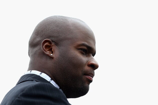 DALLAS, TX - OCTOBER 11:  Former player Vince Young watches a game between the Oklahoma Sooners and the Texas Longhorns at Cotton Bowl on October 11, 2014 in Dallas, Texas.  (Photo by Ronald Martinez/Getty Images)