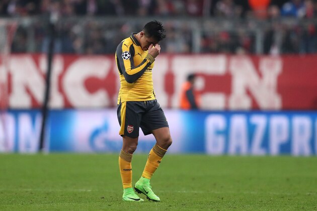 MUNICH, BAVARIA - FEBRUARY 15:  Alexis Sanchez of Arsenal looks dejected after Bayern's third goal during the UEFA Champions League Round of 16 first leg match between FC Bayern Muenchen and Arsenal FC at Allianz Arena on February 15, 2017 in Munich, Germany.  (Photo by Chris Brunskill Ltd/Getty Images)