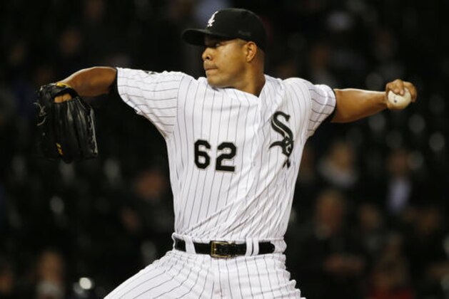 FILE - In this Sept. 29, 2016 file photo, Chicago White Sox starter Jose Quintana throws against the Tampa Bay Rays during the first inning of a baseball game in Chicago. The Chicago White Sox made their intentions clear with two huge moves at the winter meetings, and they come to spring training stocked with new young players and a huge task still in front of them. (AP Photo/Nam Y. Huh, File)