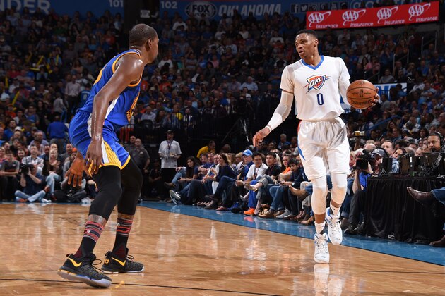 OKLAHOMA CITY, OK - FEBRUARY 11: Russell Westbrook #0 of the Oklahoma City Thunder handles the ball against the Golden State Warriors on February 11, 2017 at Chesapeake Energy Arena in Oklahoma City, Oklahoma. NOTE TO USER: User expressly acknowledges and agrees that, by downloading and or using this photograph, User is consenting to the terms and conditions of the Getty Images License Agreement. Mandatory Copyright Notice: Copyright 2017 NBAE (Photo by Andrew D. Bernstein/NBAE via Getty Images)
