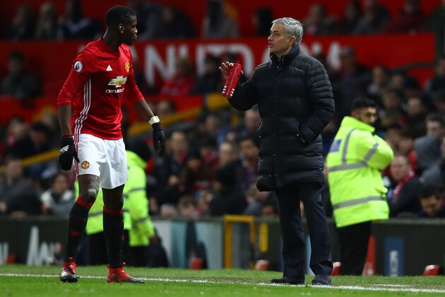 MANCHESTER, ENGLAND - DECEMBER 11:  Jose Mourinho, Manager of Manchester United gives instruction to Paul Pogba during the Premier League match between Manchester United and Tottenham Hotspur at Old Trafford on December 11, 2016 in Manchester, England.  (Photo by Clive Brunskill/Getty Images)