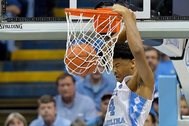 CHAPEL HILL, NC - FEBRUARY 18:  Isaiah Hicks #4 of the North Carolina Tar Heels dunks against the Virginia Cavaliers during the game at the Dean Smith Center on February 18, 2017 in Chapel Hill, North Carolina.  (Photo by Grant Halverson/Getty Images)