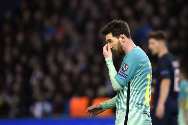 Barcelona's Argentinian forward Lionel Messi gestures during the UEFA Champions League round of 16 first leg football match between Paris Saint-Germain and FC Barcelona on February 14, 2017 at the Parc des Princes stadium in Paris. 
 / AFP / LIONEL BONAVENTURE        (Photo credit should read LIONEL BONAVENTURE/AFP/Getty Images)