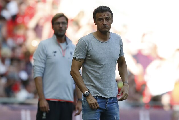 Barcelona's coach Luis Enrique (R) and Liverpool's German manager Jurgen Klopp watch from the touchline during the pre-season International Champions Cup football match between Spanish champions, Barcelona and Liverpool at Wembley stadium in London on August 6, 2016. / AFP / Ian KINGTON (Photo credit should read IAN KINGTON/AFP/Getty Images) Barcelona's coach Luis Enrique (R) and Liverpool's German manager Jurgen Klopp watch from the touchline during the pre-season International Champions Cup football match between Spanish champions, Barcelona and Liverpool at Wembley stadium in London on August 6, 2016. / AFP / Ian KINGTON (Photo credit should read IAN KINGTON/AFP/Getty Images)