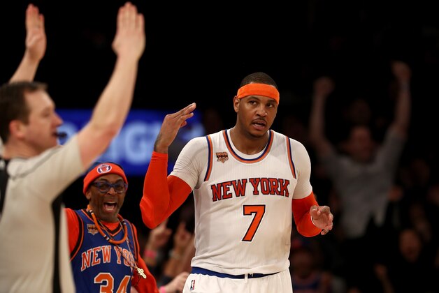 NEW YORK, NY - FEBRUARY 12:  Carmelo Anthony #7 of the New York Knicks celebrates his three point shot in the final minutes of the game against the San Antonio Spurs at Madison Square Garden on February 12, 2017 in New York City. NOTE TO USER: User expressly acknowledges and agrees that, by downloading and or using this Photograph, user is consenting to the terms and conditions of the Getty Images License Agreement  (Photo by Elsa/Getty Images)