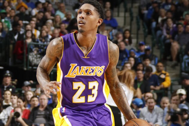 DALLAS, TX - JANUARY 22: Lou Williams #23 of the Los Angeles Lakers handles the ball against the Dallas Mavericks on January 22, 2017 at the American Airlines Center in Dallas, Texas. NOTE TO USER: User expressly acknowledges and agrees that, by downloading and or using this photograph, User is consenting to the terms and conditions of the Getty Images License Agreement. Mandatory Copyright Notice: Copyright 2017 NBAE (Photo by Danny Bollinger/NBAE via Getty Images)