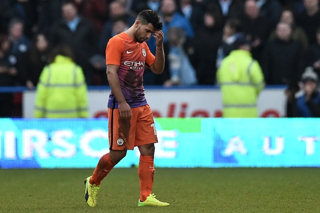 Manchester City's Argentinian striker Sergio Aguero reacts as he leaves the pitch after the English FA Cup fifth round football match between Huddersfield Town and Manchester City at the John Smith stadium in Huddersfield, northern England on February 18, 2017.
The game finished 0-0. / AFP / OLI SCARFF / RESTRICTED TO EDITORIAL USE. No use with unauthorized audio, video, data, fixture lists, club/league logos or 'live' services. Online in-match use limited to 75 images, no video emulation. No use in betting, games or single club/league/player publications.  /         (Photo credit should read OLI SCARFF/AFP/Getty Images)