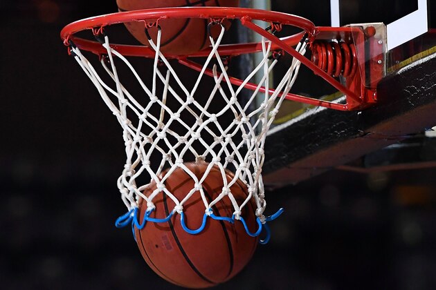 CAIRNS, AUSTRALIA - FEBRUARY 05:  Seen are game balls falling through the hoop before the start of the round 18 NBL match between the Cairns Taipans and the Perth Wildcats at the Cairns Convention Centre on February 5, 2017 in Cairns, Australia.  (Photo by Ian Hitchcock/Getty Images)