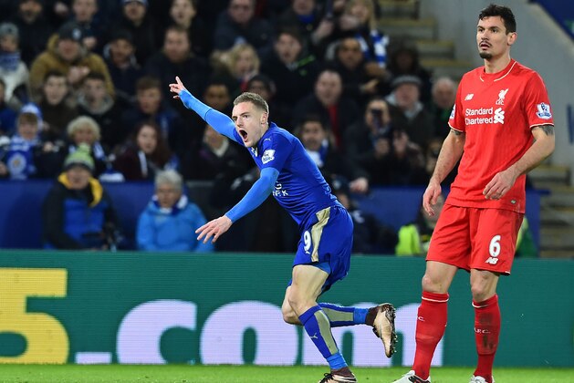 Liverpool's Croatian defender Dejan Lovren (R) looks on as Leicester City's English striker Jamie Vardy (L) celebrates scoring the opening goal of the English Premier League football match between Leicester City and Liverpool at King Power Stadium in Leicester, central England on February 2, 2016. / AFP / Ben STANSALL / RESTRICTED TO EDITORIAL USE. No use with unauthorized audio, video, data, fixture lists, club/league logos or 'live' services. Online in-match use limited to 75 images, no video emulation. No use in betting, games or single club/league/player publications.  /         (Photo credit should read BEN STANSALL/AFP/Getty Images)