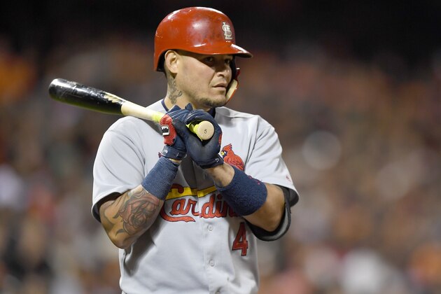 SAN FRANCISCO, CA - SEPTEMBER 16:  Yadier Molina #4 of the St. Louis Cardinals bats against the San Francisco Giants in the top of the fifth inning at AT&T Park on September 16, 2016 in San Francisco, California.  (Photo by Thearon W. Henderson/Getty Images)