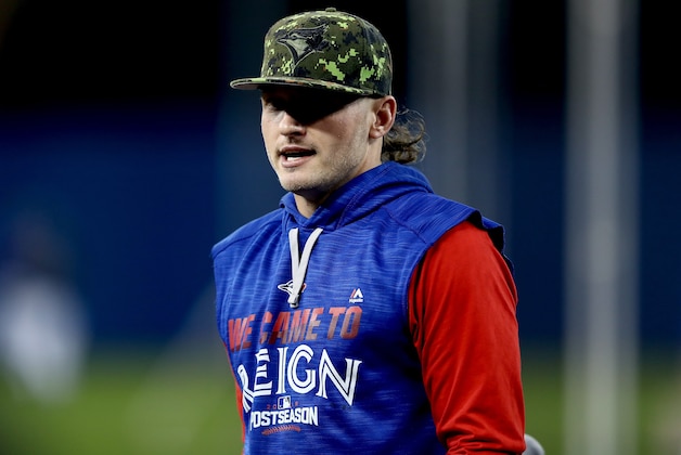 TORONTO, ON - OCTOBER 17:  Josh Donaldson #20 of the Toronto Blue Jays warms up during batting practice prior to game three of the American League Championship aagainst the Cleveland Indians Series at Rogers Centre on October 17, 2016 in Toronto, Canada.  (Photo by Elsa/Getty Images)
