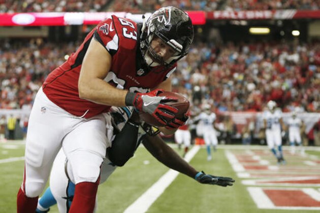 FILE - In this Oct. 2, 2016, file photo, Atlanta Falcons tight end Jacob Tamme (83) scores a touchdown during the first half of an NFL football game against the Carolina Panthers, in Atlanta. The Falcons return from a bye week hoping that cornerback Desmond Trufant, running back Tevin Coleman and tight end Jacob Tamme are getting close to returning from injuries. Trufant and Tamme might not be ready in time to face Arizona at the Georgia Dome on Sunday, but coach Dan Quinn believes they'll be back soon. (AP Photo/John Bazemore, File)