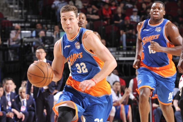 HOUSTON, TX - OCTOBER 2:  Jimmer Fredette #32 of the Shanghai Sharks drives to the basket against the Houston Rockets during a preseason game on October 2, 2016 at the Toyota Center in Houston, Texas. NOTE TO USER: User expressly acknowledges and agrees that, by downloading and or using this photograph, User is consenting to the terms and conditions of the Getty Images License Agreement. Mandatory Copyright Notice: Copyright 2016 NBAE (Photo by Bill Baptist/NBAE via Getty Images)