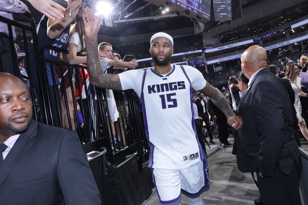 SACRAMENTO, CA - FEBRUARY 12: DeMarcus Cousins #15 of the Sacramento Kings greets fans upon entering the tunnel after defeating the New Orleans Pelicans on February 12, 2017 at Golden 1 Center in Sacramento, California. NOTE TO USER: User expressly acknowledges and agrees that, by downloading and or using this photograph, User is consenting to the terms and conditions of the Getty Images Agreement. Mandatory Copyright Notice: Copyright 2017 NBAE (Photo by Rocky Widner/NBAE via Getty Images)