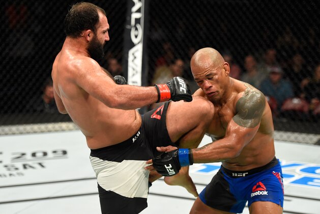 HALIFAX, NS - FEBRUARY 19:  (L-R) Johny Hendricks lands a knee to the head of Hector Lombard of Cuba in their middleweight fight during the UFC Fight Night event inside the Scotiabank Centre on February 19, 2017 in Halifax, Nova Scotia, Canada. (Photo by Josh Hedges/Zuffa LLC/Zuffa LLC via Getty Images)