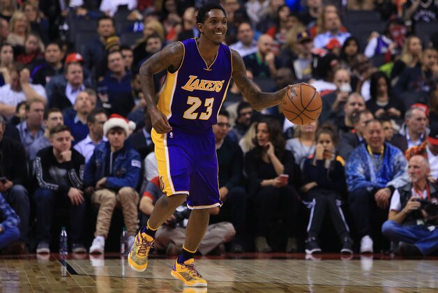 TORONTO, ON - DECEMBER 02:  Lou Williams #23 of the Los Angeles Lakers dribbles the ball during the first half of an NBA game against the Toronto Raptors at Air Canada Centre on December 2, 2016 in Toronto, Canada.  NOTE TO USER: User expressly acknowledges and agrees that, by downloading and or using this photograph, User is consenting to the terms and conditions of the Getty Images License Agreement.  (Photo by Vaughn Ridley/Getty Images)