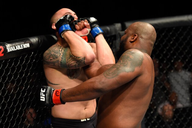 HALIFAX, NS - FEBRUARY 19:  (R-L) Derrick Lewis punches Travis Browne in their heavyweight fight during the UFC Fight Night event inside the Scotiabank Centre on February 19, 2017 in Halifax, Nova Scotia, Canada. (Photo by Josh Hedges/Zuffa LLC/Zuffa LLC via Getty Images)