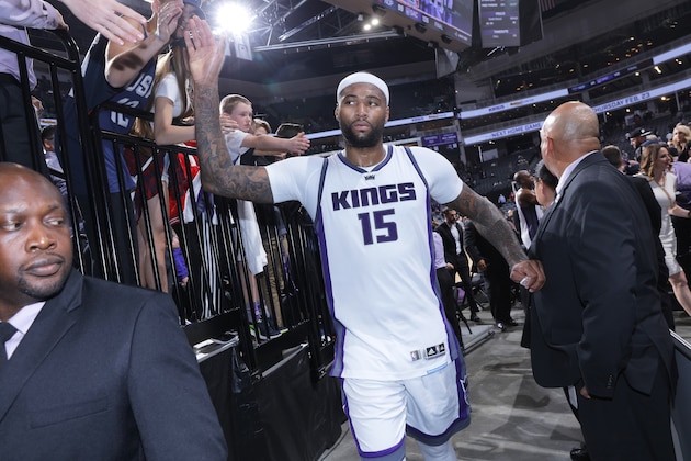 SACRAMENTO, CA - FEBRUARY 12: DeMarcus Cousins #15 of the Sacramento Kings greets fans upon entering the tunnel after defeating the New Orleans Pelicans on February 12, 2017 at Golden 1 Center in Sacramento, California. NOTE TO USER: User expressly acknowledges and agrees that, by downloading and or using this photograph, User is consenting to the terms and conditions of the Getty Images Agreement. Mandatory Copyright Notice: Copyright 2017 NBAE (Photo by Rocky Widner/NBAE via Getty Images)