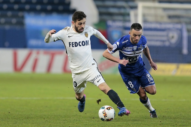 Monaco's Portuguese midfielder Bernardo Silva (L) vies with Bastia's French midfielder Gael Danic during the L1 football match Bastia (SCB) against Monaco (ASM) on February 17, 2017 in the Armand Cesari stadium in Bastia on the French Mediterranean island of Corsica.  / AFP / PASCAL POCHARD-CASABIANCA        (Photo credit should read PASCAL POCHARD-CASABIANCA/AFP/Getty Images)