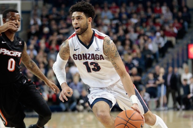 SPOKANE, WA - FEBRUARY 18:  Josh Perkins #13 of the Gonzaga Bulldogs drives against Maleke Haynes #0 of the Pacific Tigers  in the first half at McCarthey Athletic Center on February 18, 2017 in Spokane, Washington.  (Photo by William Mancebo/Getty Images)