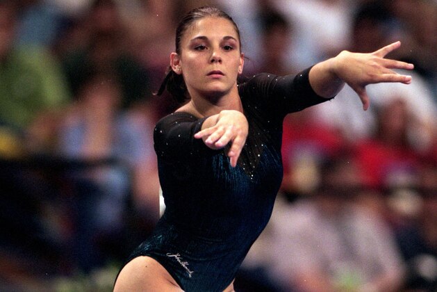 28 Aug 1999: Jamie Dantzscher moves in her floor exercise during the US Gymnastic Championships at the Arco Arena in Sacremento, California.