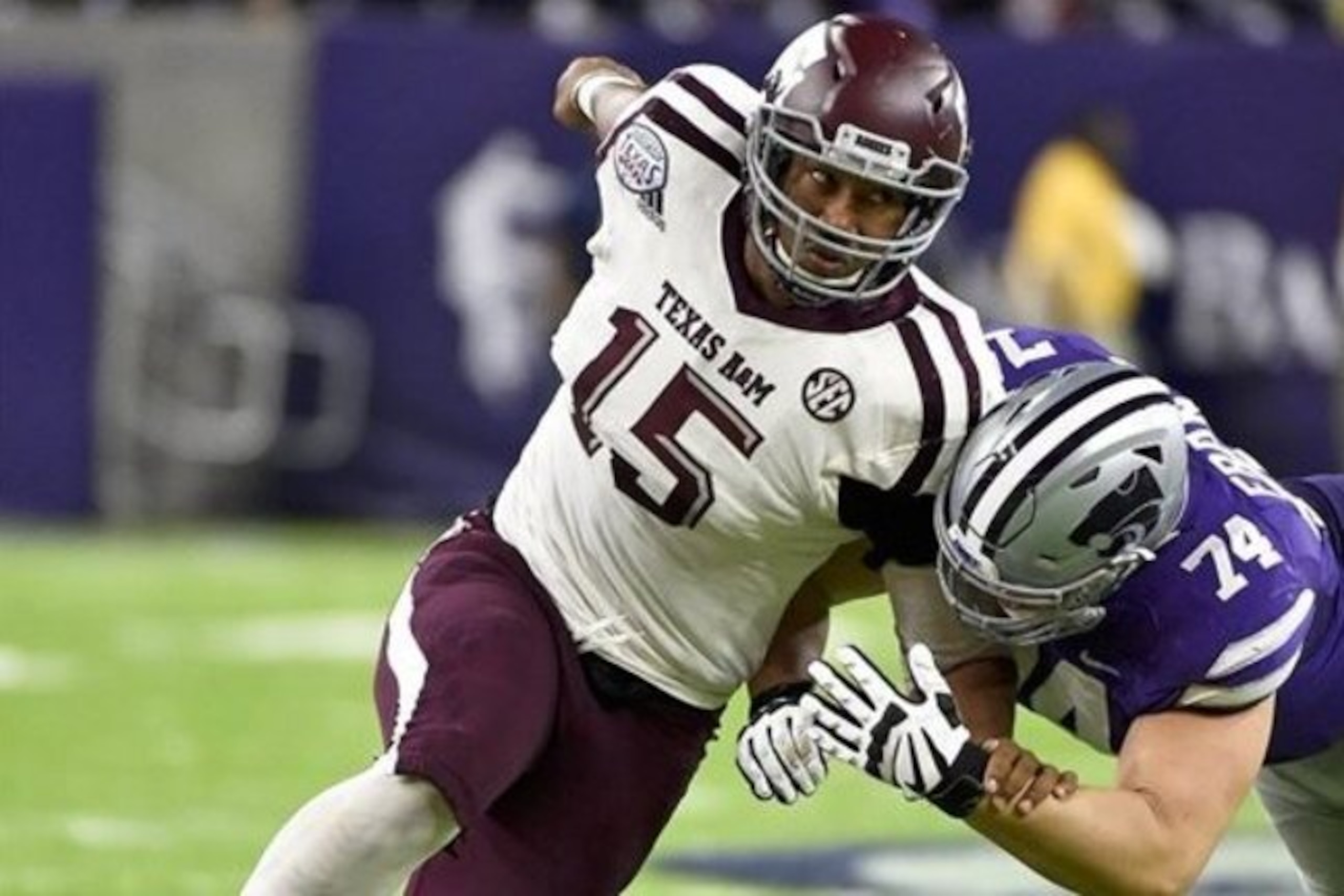 Texas A&M defensive lineman Myles Garrett (15) tries to get around Kansas State offensive lineman Scott Frantz during the second half of the Texas Bowl NCAA college football game, Wednesday, Dec. 28, 2016, in Houston. Kansas State won the game, 33-28. (AP Photo/Eric Christian Smith)